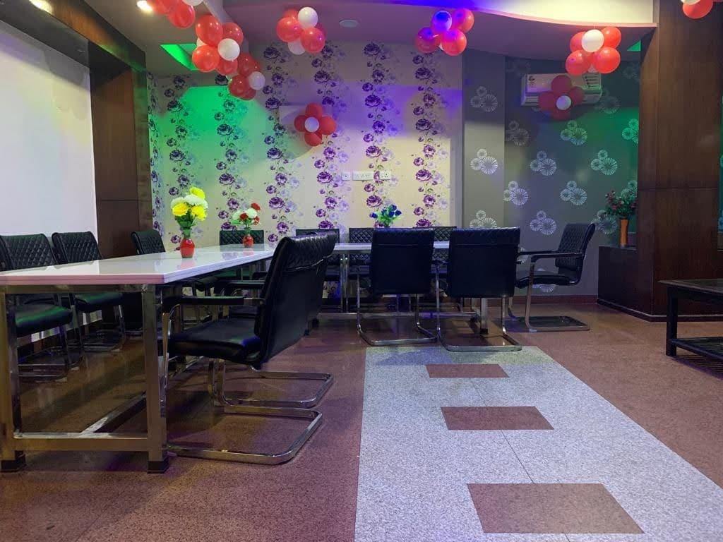 Cozy guest lounge seating inside the mini hall at Hotel Park Avenue Sikar
